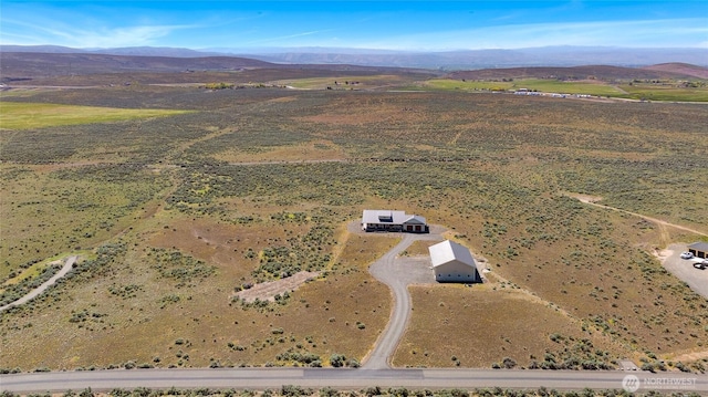 bird's eye view featuring a mountain view and a rural view