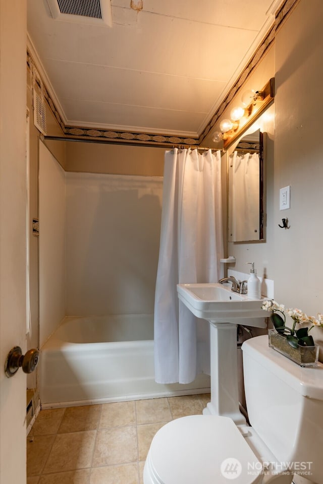 full bathroom with tile patterned flooring, shower / bath combination with curtain, toilet, and visible vents
