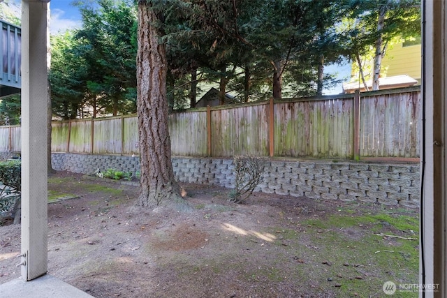 view of yard featuring a fenced backyard