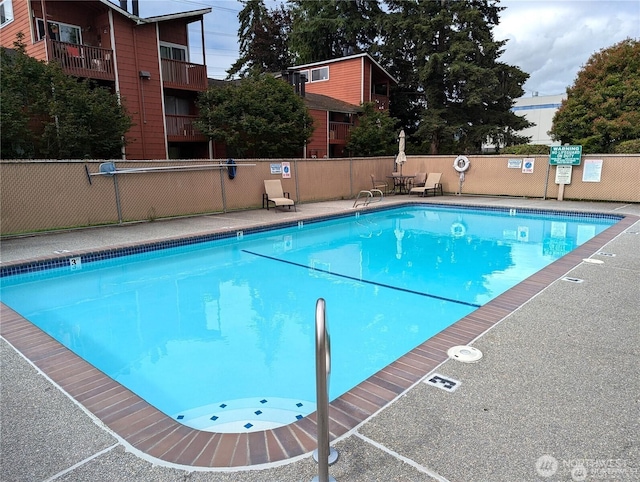 pool featuring fence