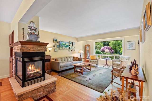 living room featuring a fireplace