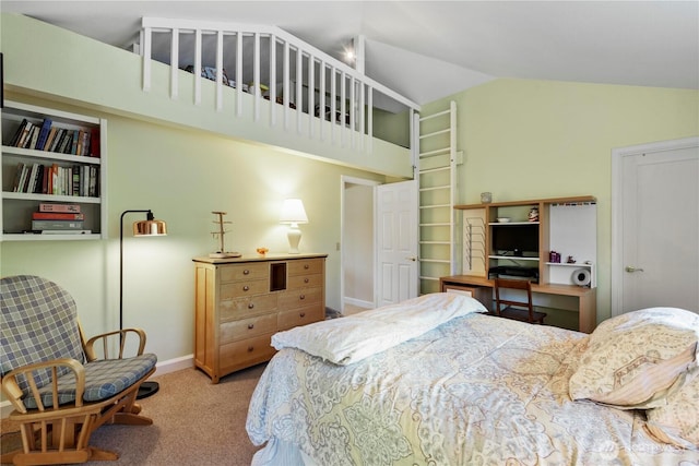 bedroom with carpet flooring, lofted ceiling, and baseboards
