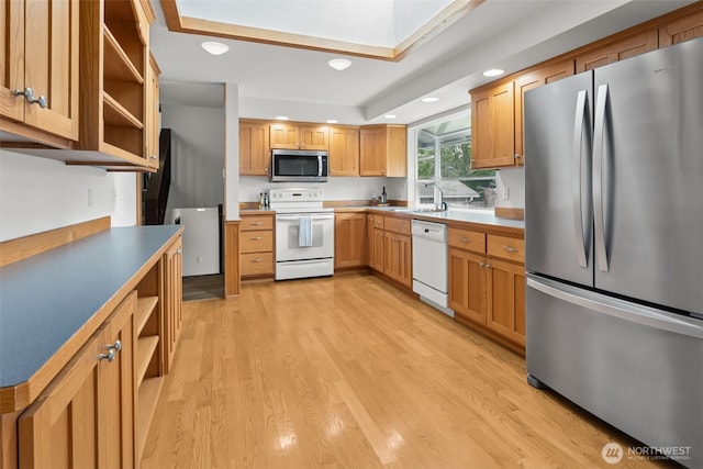 kitchen featuring light wood-type flooring, open shelves, stainless steel appliances, and recessed lighting