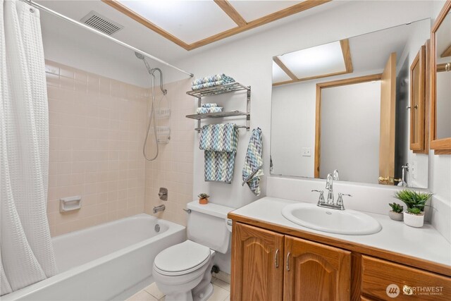 bathroom with vanity, shower / bathtub combination with curtain, toilet, and visible vents