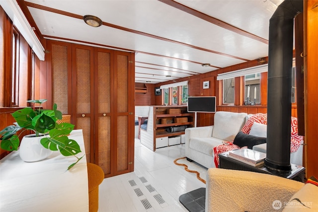 living room with wood walls