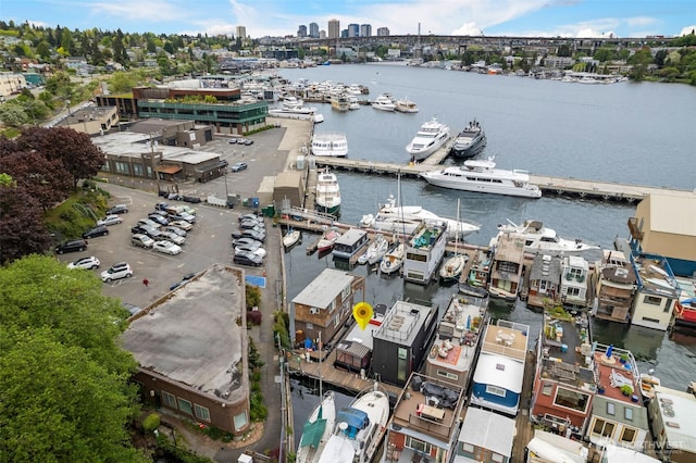bird's eye view with a water view and a city view