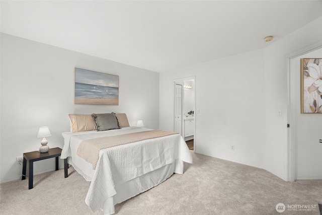 carpeted bedroom featuring baseboards