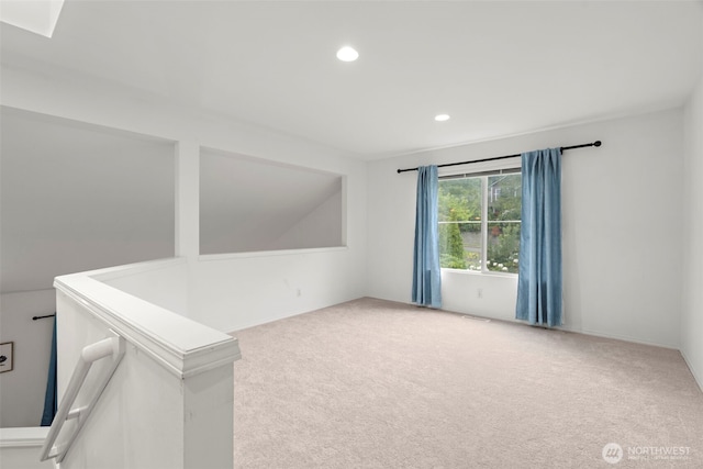 empty room featuring carpet floors and recessed lighting