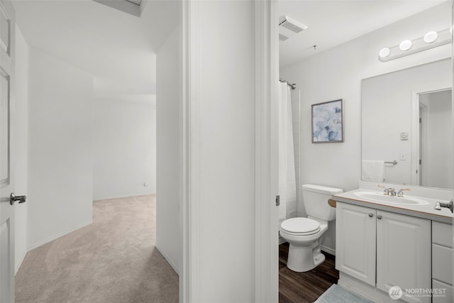 full bath featuring vanity and toilet