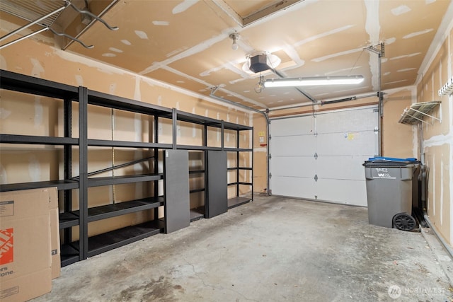 garage featuring a garage door opener