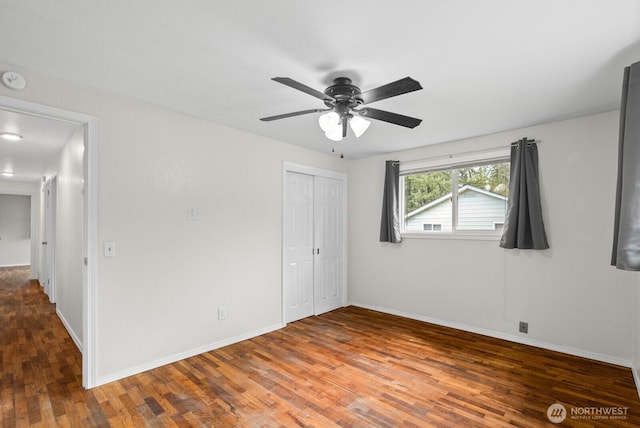 2617 College St SE, Lacey, WA 98503 - spare room with baseboards, a ceiling fan, and wood finished floors