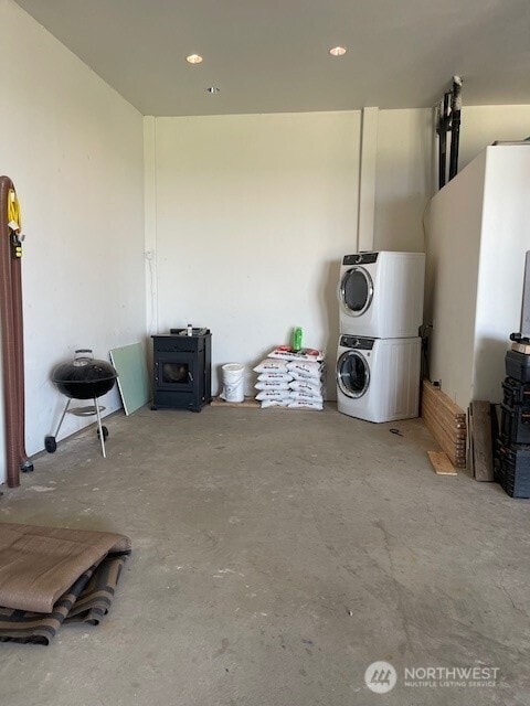 interior space featuring stacked washer and dryer