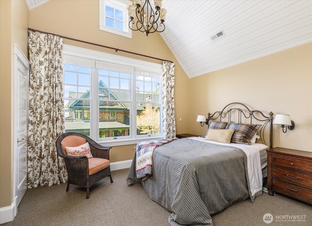 5848 Mutiny Bay Rd, Freeland, WA 98249 - carpeted bedroom with baseboards, vaulted ceiling, an inviting chandelier, and visible vents