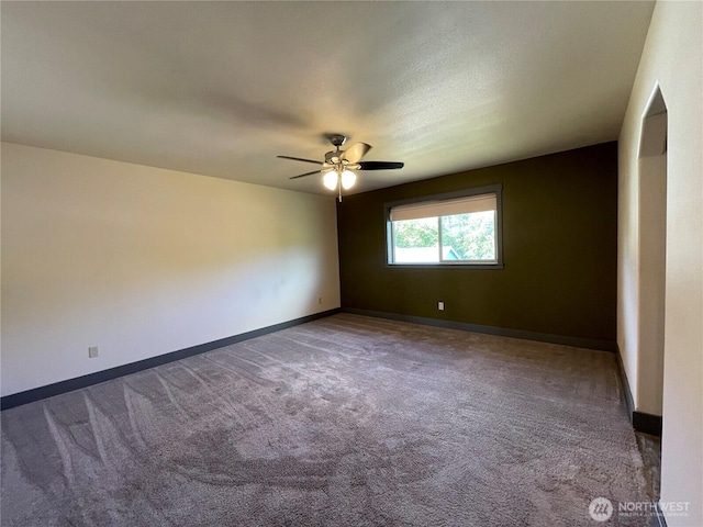 415 Olympic View Dr NE, Ocean Shores, WA 98569 - unfurnished room with ceiling fan, carpet, and baseboards