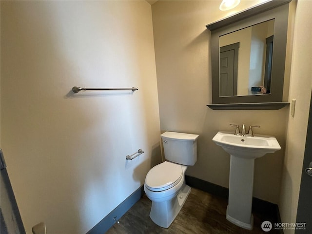 415 Olympic View Dr NE, Ocean Shores, WA 98569 - half bath with toilet, wood finished floors, and baseboards