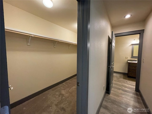 415 Olympic View Dr NE, Ocean Shores, WA 98569 - spacious closet featuring wood finished floors