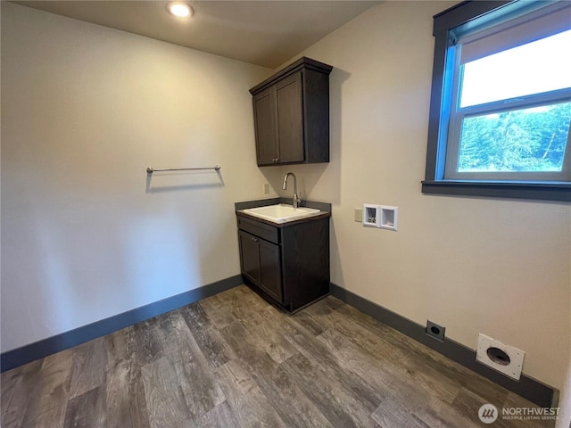 415 Olympic View Dr NE, Ocean Shores, WA 98569 - laundry area with hookup for a washing machine, electric dryer hookup, dark wood-style floors, baseboards, and recessed lighting