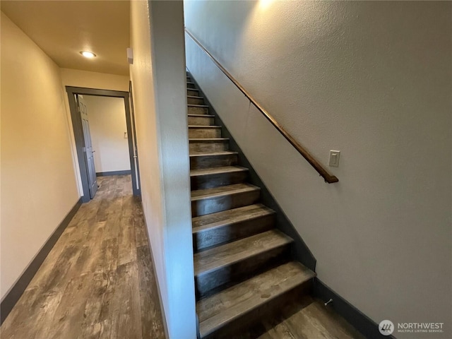 415 Olympic View Dr NE, Ocean Shores, WA 98569 - staircase with wood finished floors and baseboards