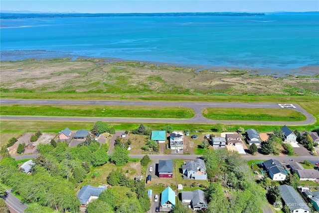 415 Olympic View Dr NE, Ocean Shores, WA 98569 - aerial overview of property's location featuring a nearby body of water and nearby suburban area