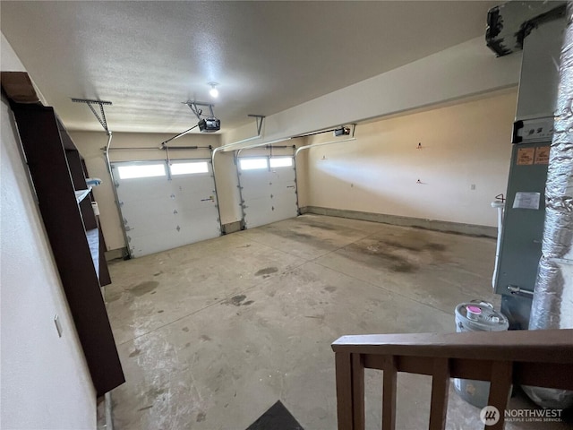 415 Olympic View Dr NE, Ocean Shores, WA 98569 - garage featuring a garage door opener