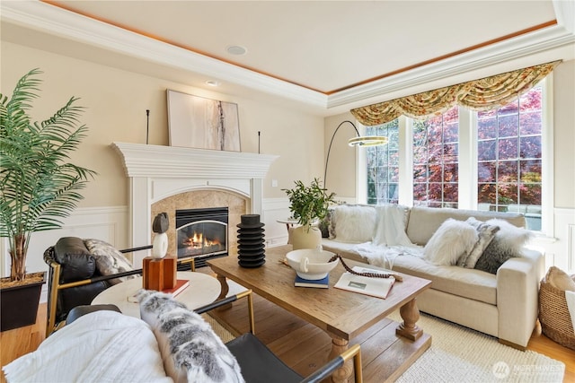 13914 SE 88th Pl, Newcastle, WA 98059 - living room with a tray ceiling, wainscoting, ornamental molding, and a decorative wall