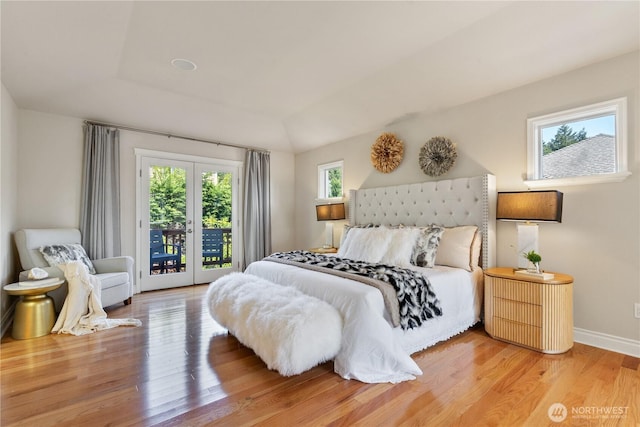 13914 SE 88th Pl, Newcastle, WA 98059 - bedroom featuring baseboards, access to exterior, and light wood-type flooring