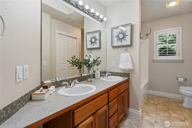 13914 SE 88th Pl, Newcastle, WA 98059 - full bathroom with double vanity, toilet, tub / shower combination, and a sink