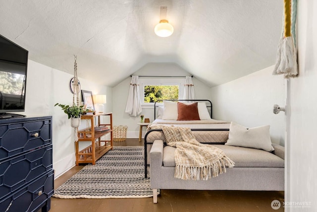 1002 S Adams St, Tacoma, WA 98405 - bedroom with wood finished floors and vaulted ceiling