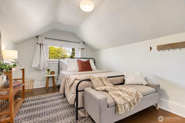 1002 S Adams St, Tacoma, WA 98405 - bedroom with baseboards, vaulted ceiling, and dark wood finished floors