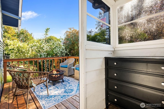 1002 S Adams St, Tacoma, WA 98405 - wooden deck featuring a fire pit