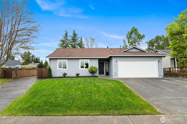 single story home featuring a garage, aphalt driveway, fence, and a front yard