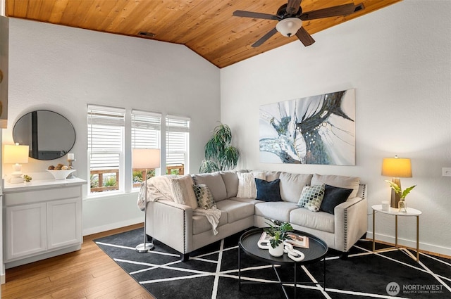 living area featuring wood ceiling, ceiling fan, baseboards, lofted ceiling, and light wood-style floors