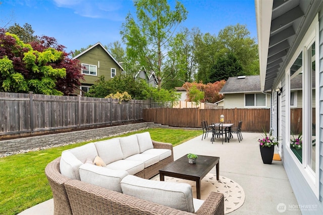 view of patio / terrace featuring an outdoor living space, a fenced backyard, and outdoor dining space