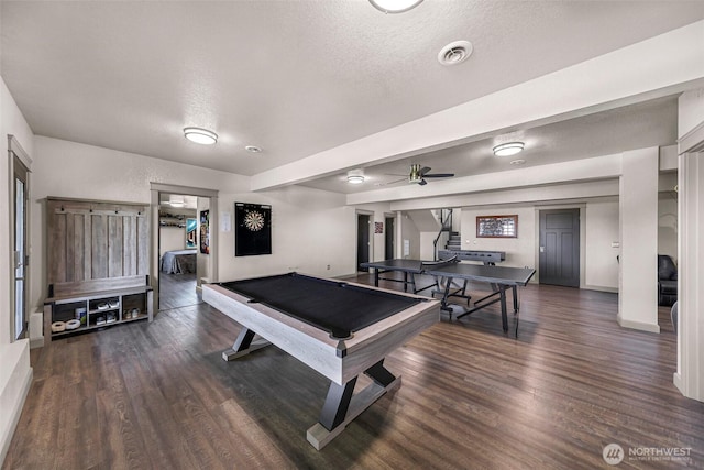 game room featuring a textured ceiling, baseboards, a ceiling fan, and wood finished floors