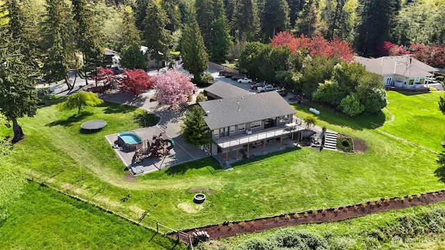 drone / aerial view with a forest view