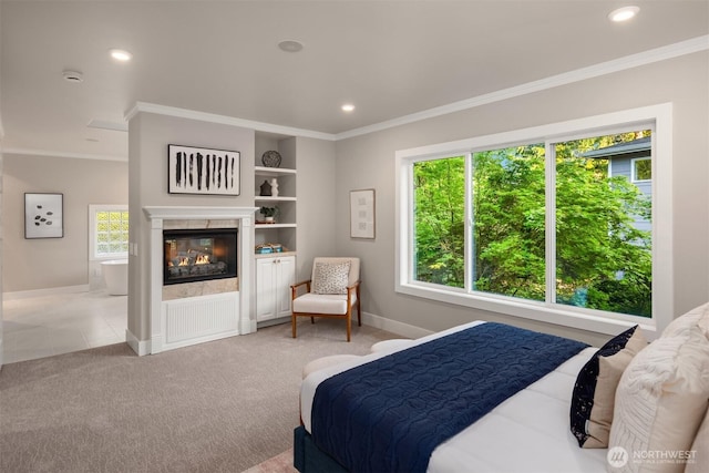 9732 Slater Ave NE, Kirkland, WA 98033 - carpeted bedroom featuring baseboards, ornamental molding, recessed lighting, and a multi sided fireplace