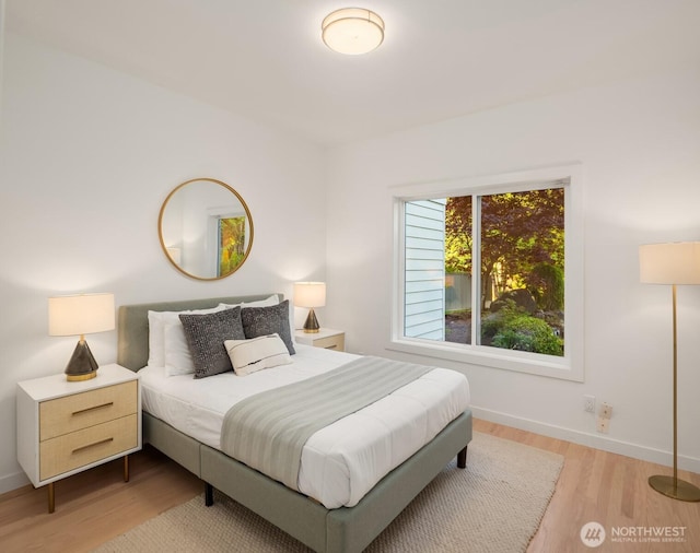 9732 Slater Ave NE, Kirkland, WA 98033 - bedroom with baseboards and light wood-style flooring