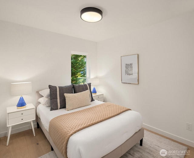 9732 Slater Ave NE, Kirkland, WA 98033 - bedroom with baseboards and wood finished floors