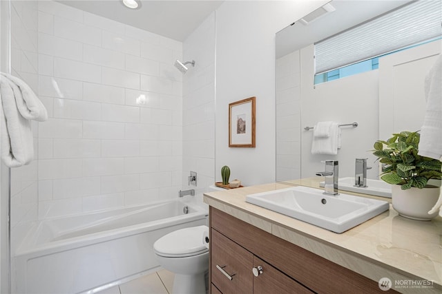 bathroom with toilet, shower / tub combination, tile patterned flooring, and vanity