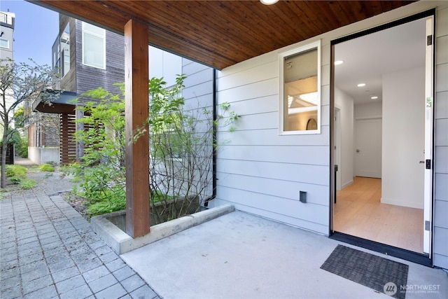 doorway to property featuring a patio