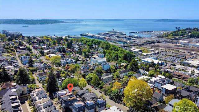 birds eye view of property featuring a water view