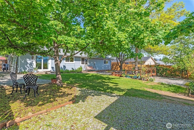 view of yard with fence