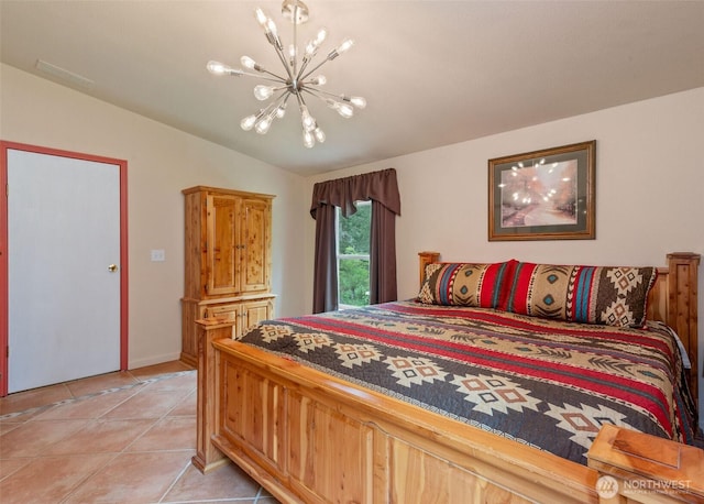 bedroom featuring visible vents, light tile patterned floors, a notable chandelier, and vaulted ceiling