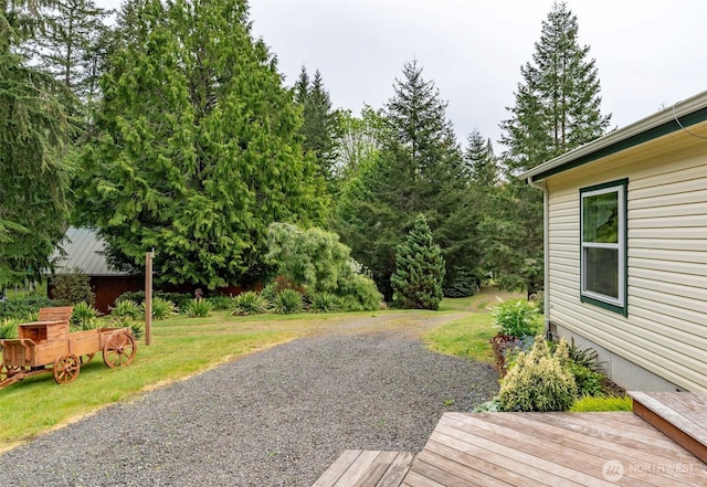 deck featuring a lawn