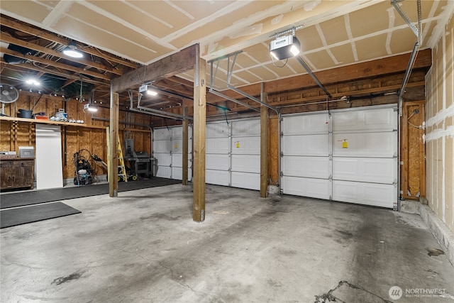 6411 86th Street Ct E, Puyallup, WA 98371 - garage featuring a garage door opener