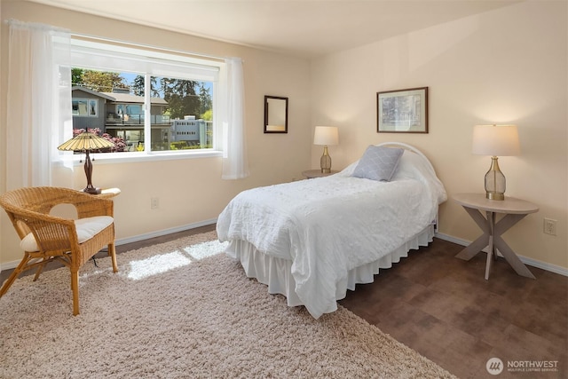 bedroom featuring baseboards