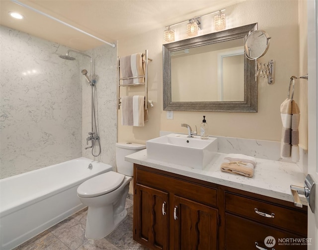 full bathroom with toilet, tub / shower combination, and vanity