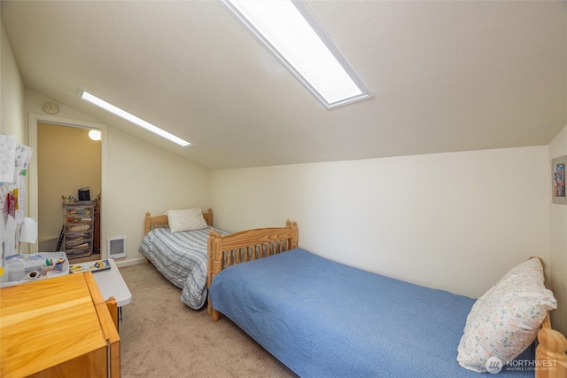 2877N Nugent Rd Unit M4, Lummi Island, WA 98262 - bedroom featuring a skylight, vaulted ceiling, and light colored carpet