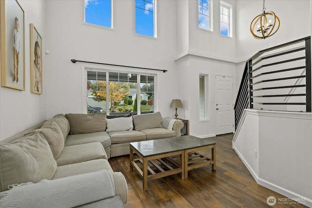 17726 83rd Dr NE, Arlington, WA 98223 - living area with a high ceiling, stairway, a chandelier, plenty of natural light, and dark wood-type flooring