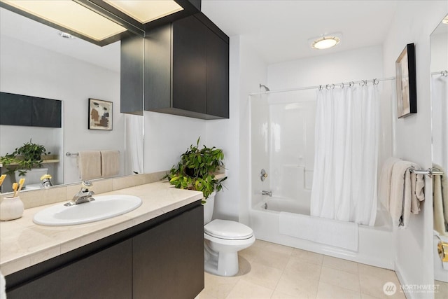 bathroom featuring vanity, tile patterned flooring, toilet, and shower / tub combo